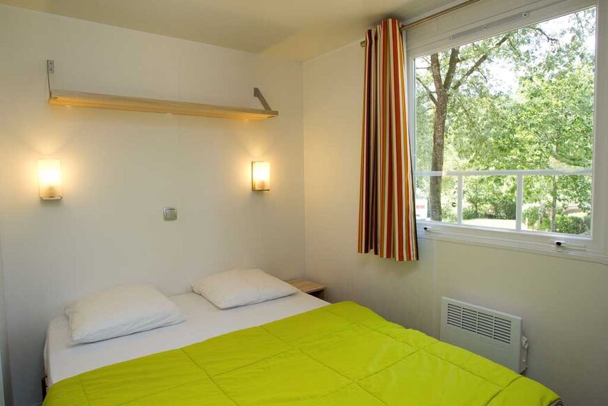 La chambre d'un mobil home résidentiel